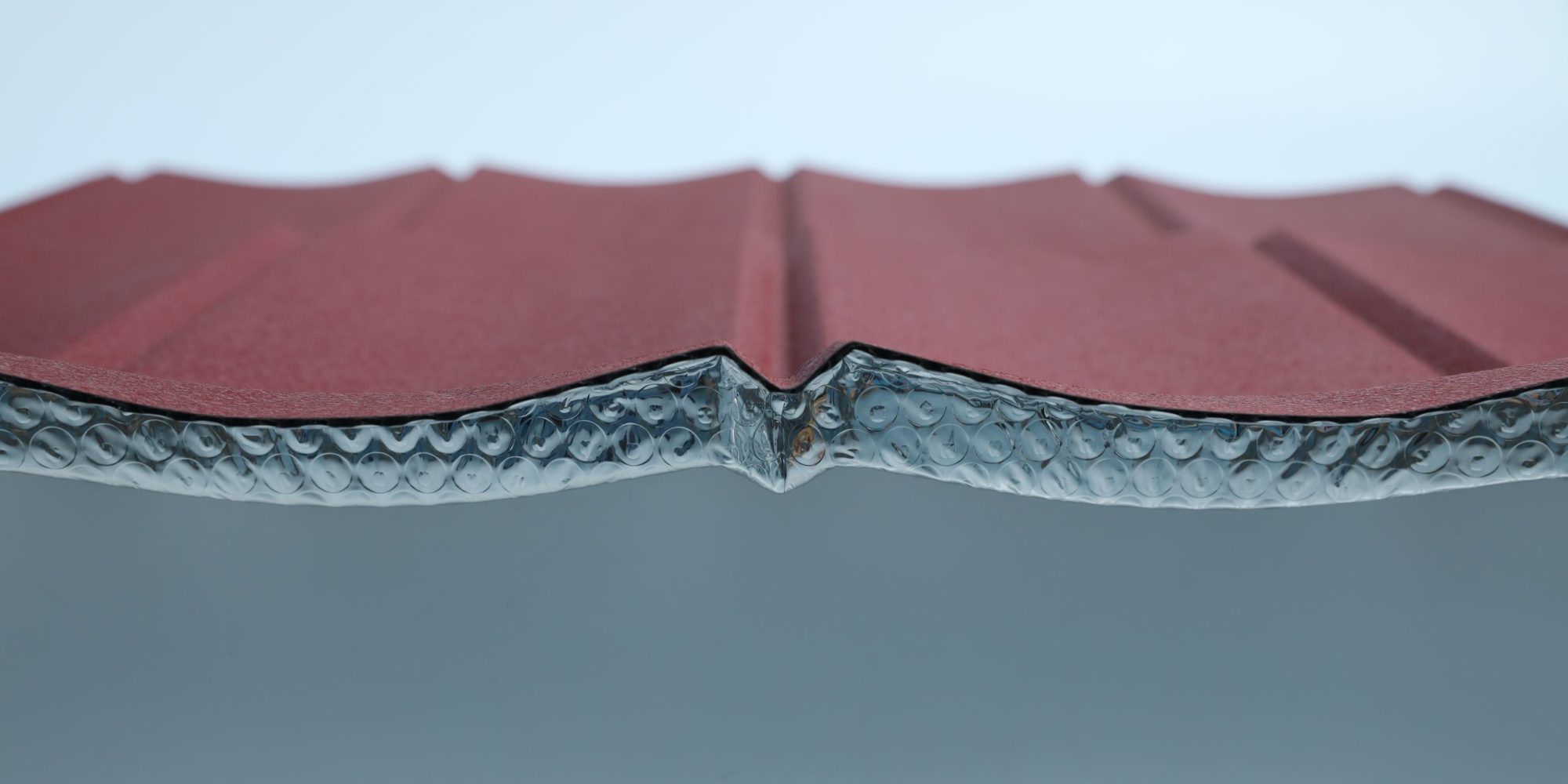 Genteng metal insulasi meredam panas